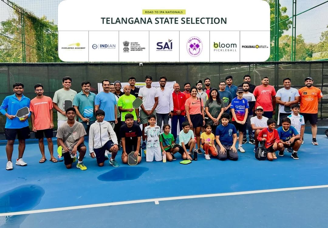 A group of diverse people enjoying a game of pickleball